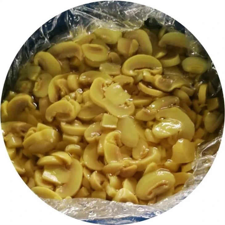 Sliced SO2 white mushroom in plastic drums